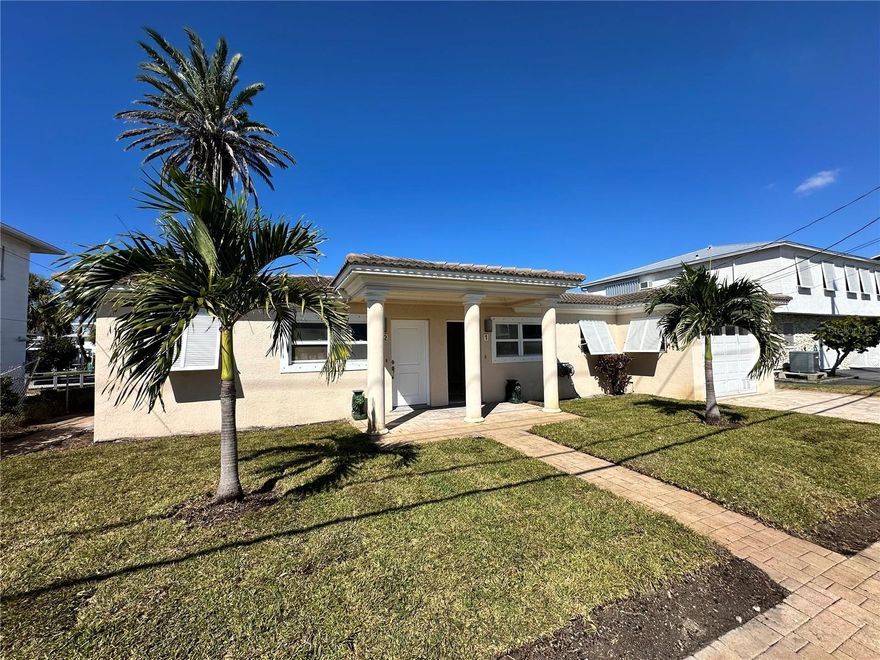 **Waterfront 1-bedroom, 1-bath duplex unit available for annual lease** with **private dock and direct canal access**. This well-maintained unit offers an updated interior and move-in-ready condition in a quiet coastal neighborhood.

The unit features an open living area with fresh carpet and neutral finishes. The updated kitchen includes solid wood cabinetry, stone countertops, tile backsplash, stainless steel appliances, and an **in-unit washer and dryer**. The bedroom is well sized with ample closet space, ceiling fan, and hurricane shutters.

The renovated bathroom includes a tiled tub/shower surround, modern vanity, and updated fixtures. Exterior features include paver walkways and patio areas, tropical landscaping, hurricane shutters, and access to a private dock suitable for boating or kayaking.

**Water, sewer, and garbage are included in rent.**
**No pets permitted.**
Tenant required to maintain renter’s insurance.

Tenant to verify all measurements and information.