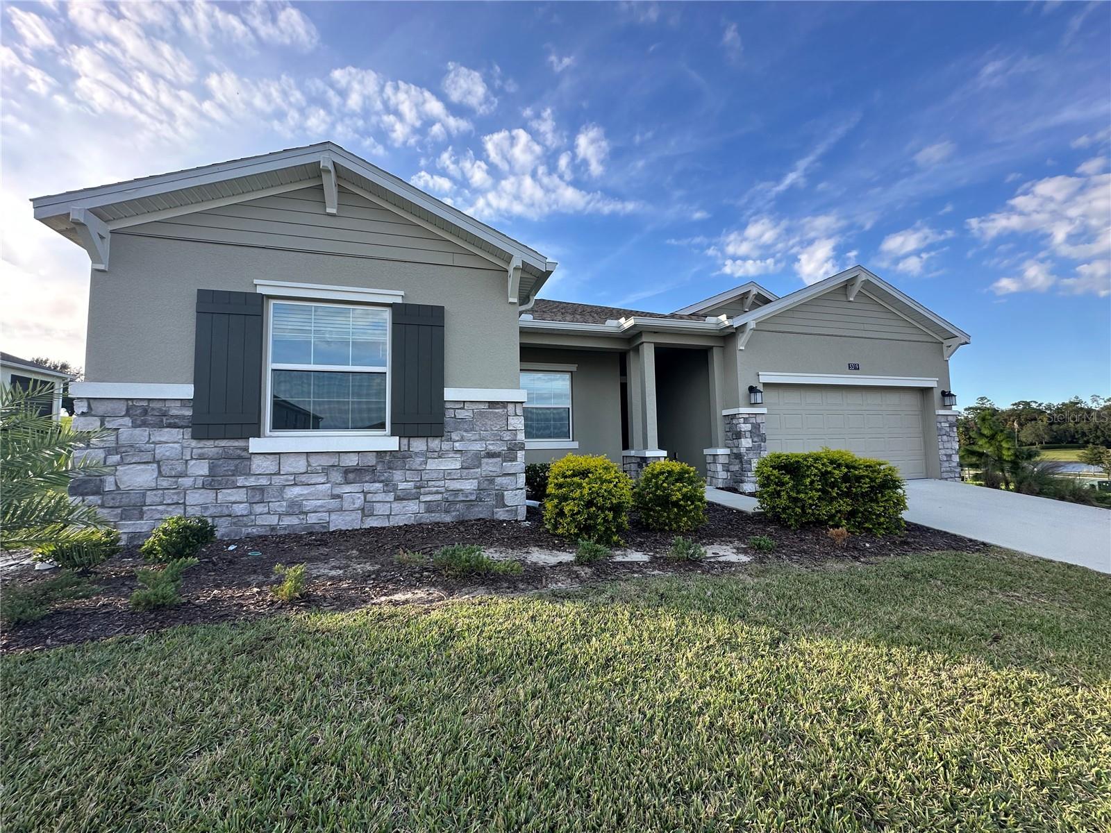Immaculate and spacious home located in the spectacular gated community Stoneybrook of Mount Dora. This home is very unique and has been perfectly maintained. Step inside the open entryway to the split floor plan featuring a bright kitchen with stainless steel appliances, tons of cabinet space, and a massive center island overlooking a cozy living space with access to the back patio and another large living space perfect for a play area or home office. The master bedroom is an absolute dream with lovely lighting and views of the open, green hills surrounding the home. The master bath has a soaking tub as the main centerpiece to this large bathroom that includes walk-in shower, double vanities and double walk-in closets. The other end of the home includes 2 bedrooms and a shared hall bath. Attached to the home is a fabulous and furnished one bed, one bath apartment full with kitchen and all appliances, spacious living area and everything you would need to fill a home! Adults only permitted to occupy the apartment which is great for a multigenerational family or a collage aged person still living with family. Stoneybrook is an active gated community with scenic walking/biking trails through a nature preserve, club house, tennis and basketball courts, and community pool. This home is perfectly located to tons of shopping and dinning options and easy access to the Orlando area with highways near by. First months rent, security deposit, and lease fee due for move in with approved $65 application