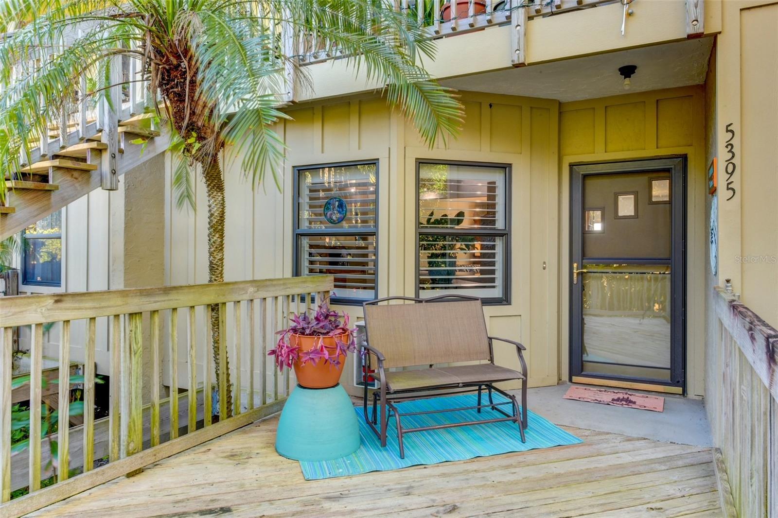 Welcome to Lake Arrowhead! This beautifully renovated 2 bedroom/2 bath home is an end unit on the first floor with gorgeous water and wildlife views. New roof installed and exterior painted in 2023 and new AC 2024! High end upgrades to this unit include new cabinets with insert drawers, countertops, Italian tile, backsplash, and appliances in the kitchen. Luxury vinyl plank flooring in the primary suite and great room. Built-ins installed in closets, plantation shutters, and fully renovated bathrooms, all tasteful modern touches chosen by an interior designer. The great room is perfect for relaxing or entertaining with high ceilings, tons of natural light, breathtaking views of the lake and sliding doors to the very private screened lanai that includes storage. The spacious primary suite has a walk-in closet, water views, and additional sliding doors to a private patio. The kitchen is stylishly appointed with quartz countertops, plenty of storage, and stainless steel appliances. This home has been completely remodeled and must be seen to appreciate the workmanship and panoramic views that make this home extraordinary. Lake Arrowhead is a hidden gem in Sarasota with only 64 units, a community pool, and a fishing dock. This tranquil and serene home is only steps away from Red Bug Slough Nature Preserve and is conveniently located near restaurants, shopping, downtown Sarasota, SRQ Airport, and the World Famous Siesta Key beaches!
