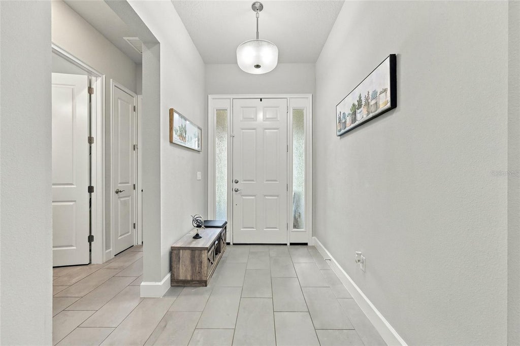 Photo of 401 Nottinghill Street, Ormond Beach, FL 32174 (MLS # O6443340)