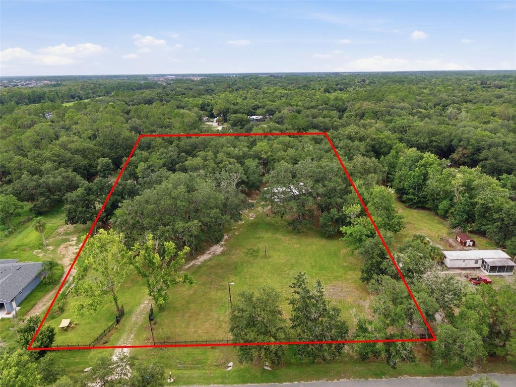 Photo of 18127 Cedarhurst Road, Orlando, FL 32820 (MLS # O6419409)