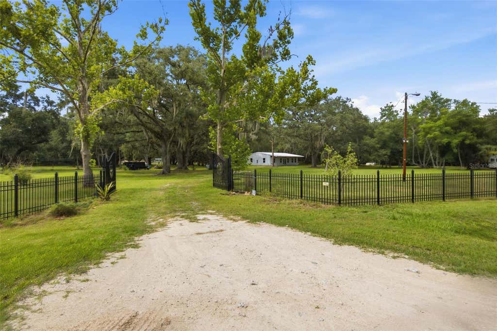 Photo of 18127 Cedarhurst Road, Orlando, FL 32820 (MLS # O6419409)