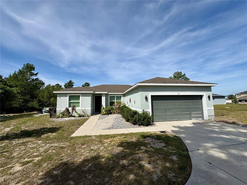 Photo of 65 Zinnia Lane E, Kissimmee, FL 34759 (MLS # S5149220)