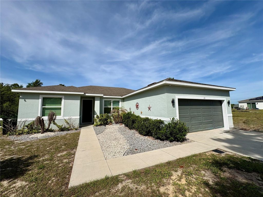 Photo of 65 Zinnia Lane E, Kissimmee, FL 34759 (MLS # S5149220)