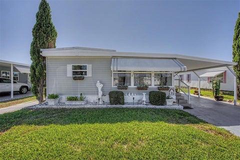 Photo of 18 Drury Lane, Tarpon Springs, FL 34689 (MLS # TB8554267)