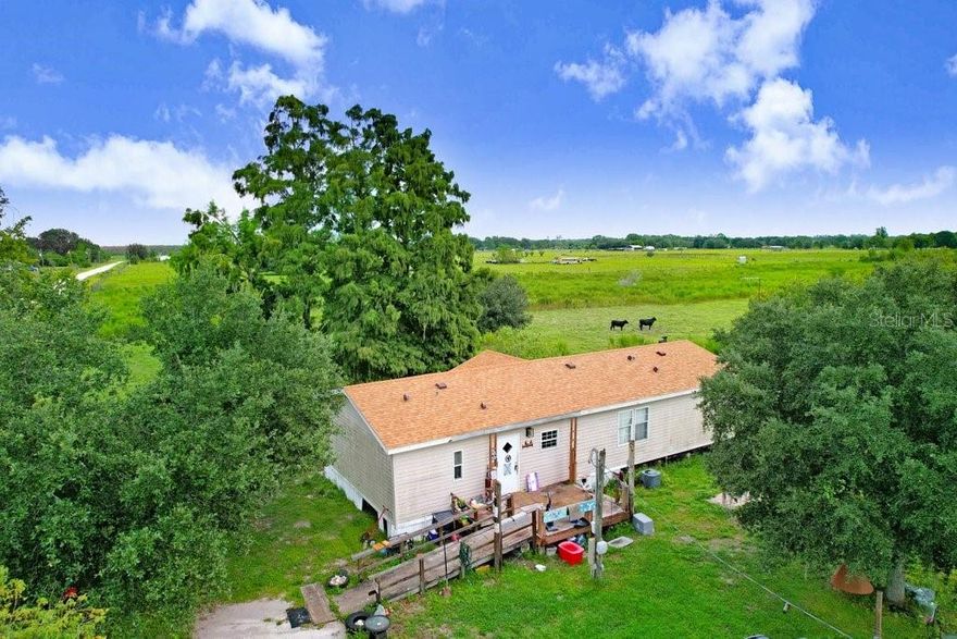 Looking for an opportunity to put your mark on a piece of land? This 5-acre property with a 3-bedroom manufactured home could be the perfect fit! Zoned for agriculture, it's ready for livestock and offers endless opportunities for those who dream of rural living. Whether you're looking to expand into farming, create your own homestead, or simply enjoy wide-open space, this property provides both flexibility and freedom. Surrounded by privacy and serenity, it's a chance to embrace country life while shaping the land into exactly what you've envisioned. The possibilities here are truly endless!