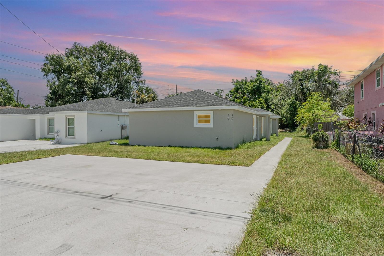 Under Construction. This newly constructed **2025 duplex** presents an incredible **investment opportunity** in the heart of **Winter Haven**, just minutes from world-famous theme parks. Each unit features a **spacious, modern layout** with **2 bedrooms and 2 bathrooms**, offering comfort, style, and functionality for tenants or guests. Built with high-quality materials, this duplex boasts **luxury vinyl flooring, sleek granite countertops, and premium stainless steel appliances**, including a **refrigerator, range hood, and microwave** in each unit. Designed with an **open-concept living space** and **abundant natural light**, this property provides a welcoming and contemporary atmosphere. A rare feature in the area, each unit has **its own electric meter and sewer meter**, adding convenience and value. Whether you're looking for a **turnkey investment, a rental property, or a vacation home near top attractions**, this **brand-new, low-maintenance duplex** offers the perfect blend of **style, comfort, and location**. **Schedule your private tour today!**