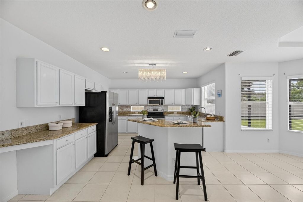 Photo of 7711 Nottinghill Sky Drive, Apollo Beach, FL 33572 (MLS # TB8404473)