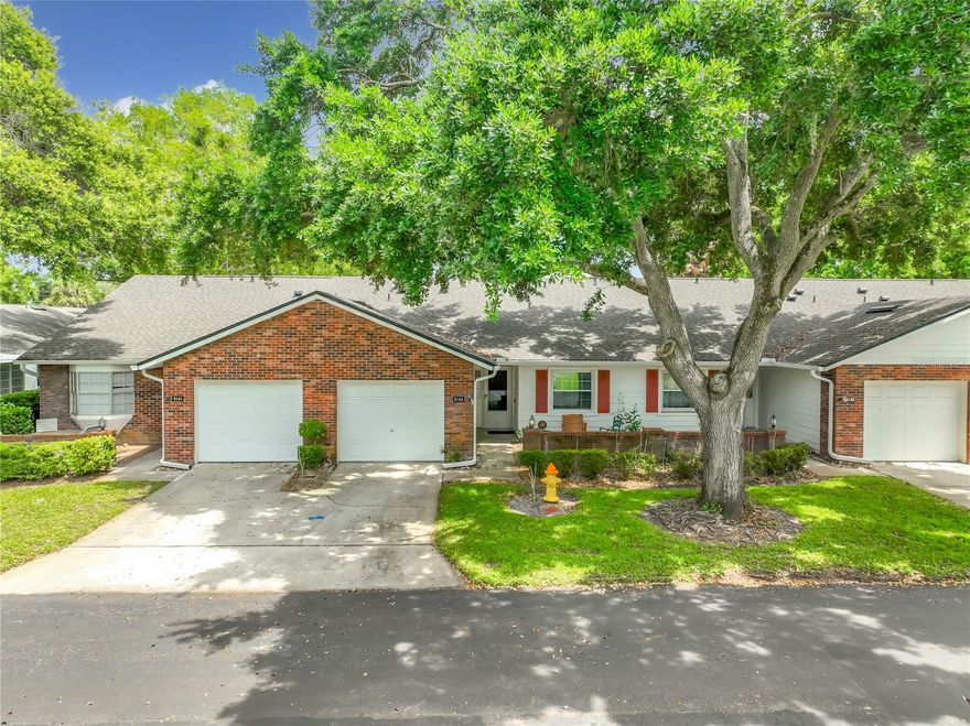 Quiet Living in the Desirable Lazy Oaks Community of Winter Park.        
Welcome to the peaceful, well-established community of Lazy Oaks in highly sought-after Winter Park. This hidden gem offers beautifully landscaped grounds, meticulous maintenance, and the added benefit of a low HOA.
This lovingly maintained 2-bedroom, 2-bath home features a spacious, thoughtfully designed floor plan with an attached garage. The home is ideally located near top-rated schools, shopping, dining, and provides convenient access to major highways.
Inside, you’ll find a neutral color palette complemented by ceramic tile and wood laminate flooring throughout. The efficient kitchen boasts gleaming white countertops, rich wood cabinetry, and a large pantry for ample storage.
The expansive great room offers flexible space for both dining and living areas, complete with a cozy wood-burning fireplace—perfect for relaxing or entertaining. Sliding glass doors open to a large, screened private lanai, ideal for morning coffee or evening unwinding.
The spacious primary suite features an en suite bath with dual sinks, a large vanity, walk-in shower, and a generous closet. A split-bedroom layout provides added privacy, with a secondary bedroom and additional  full bath.
Additional highlight: HVAC replaced in 2021.
Don’t miss this opportunity to make your home in one of Winter Park’s most charming and convenient communities!