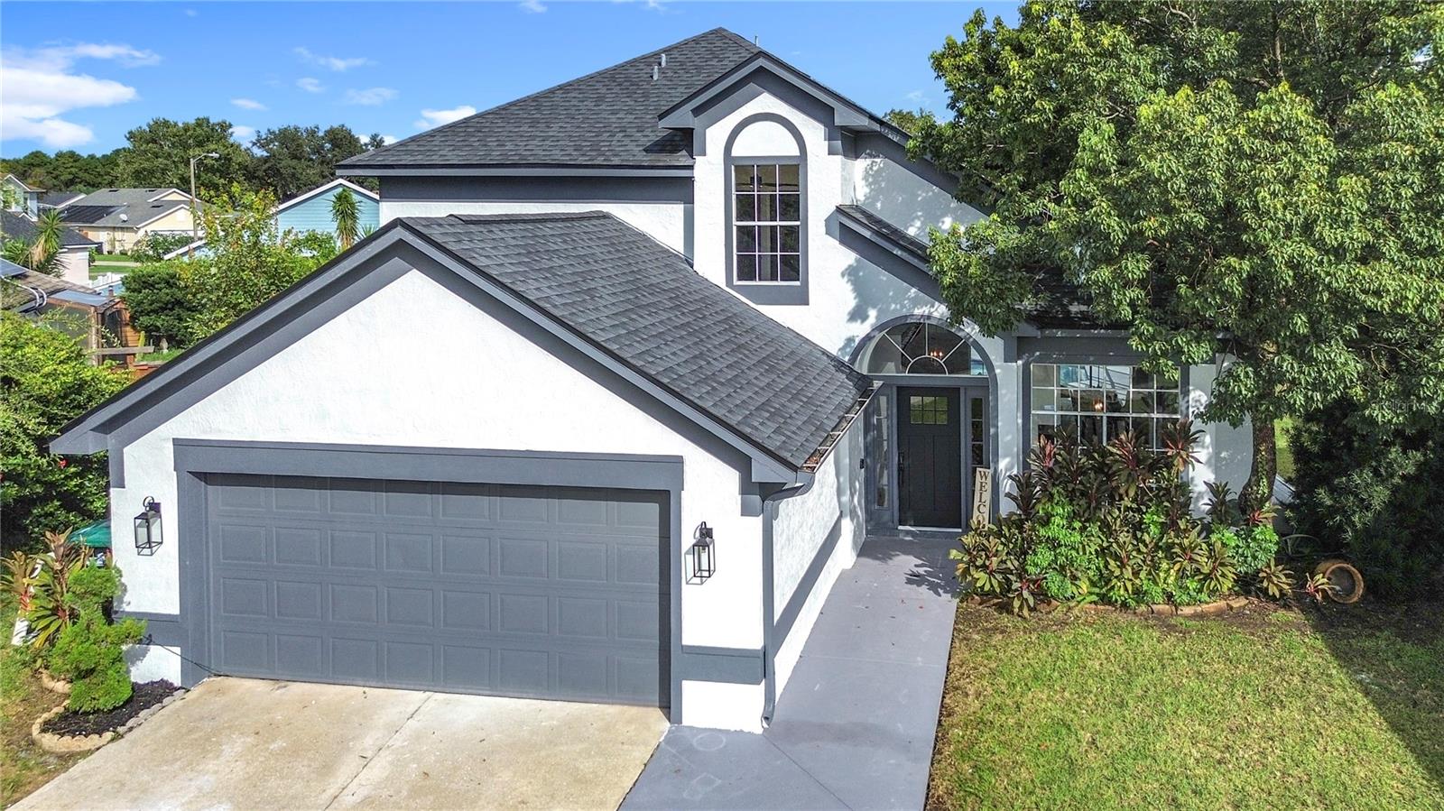 This stunning home is move-in ready and perfectly located on a quiet cul-de-sac with 1,742 sq. ft. of living space (2,307 sq. ft. total), built in 1993, and a 2-car garage. Major systems provide peace of mind with a newer roof (2021), HVAC (2019), water heater (2022), updated plumbing (2025), and a resurfaced pool (2025) — all in a community with a low HOA of just $22/month ($260/year).
Inside, the open living area features a decorative wood accent wall with fireplace and new recessed lighting. The dream kitchen, perfectly located between the dining room and breakfast dinette, boasts 42” cabinets, quartz countertops, backsplash accent wall, stainless steel appliances (refrigerator, dishwasher, range, and ductless range hood), plus a designer sink and faucet.
The upscaled bathrooms include glass shower doors, double sinks, and modern finishes, while the primary suite offers a spacious walk-in closet. Natural light flows through updated windows, highlighting luxury waterproof vinyl flooring, new ceiling fans, and stylish fixtures throughout.
Step outside to enjoy a screened and resurfaced pool with patio and a spacious backyard, perfect for gatherings. Ideally located close to major highways, restaurants, shopping, and conveniences like the mall, Walmart Supercenter, and Marshalls — this home offers the complete package of comfort, upgrades, and lifestyle.