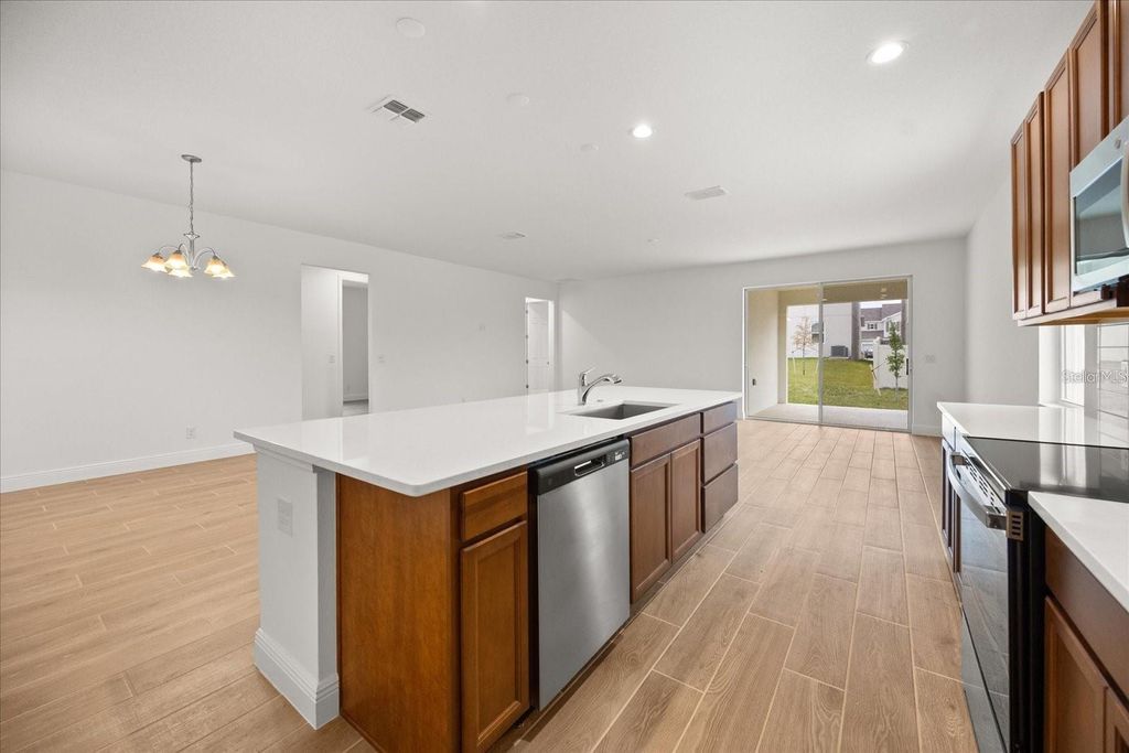 Photo of 7731 Scicli Way, Clermont, FL 34714 (MLS # O6404305)