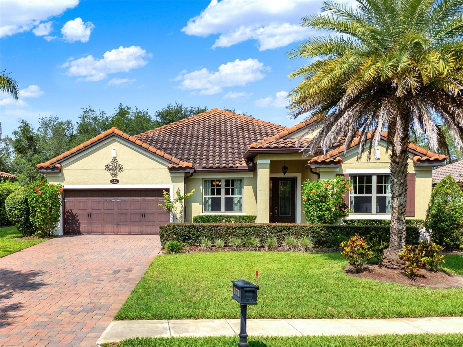 Welcome to 172 Verde Way, a beautifully upgraded 4-bedroom, 3-bath home nestled in the exclusive, gated Riviera Bella community. From the moment you arrive, the extended driveway and lush landscaping create impressive curb appeal, setting the tone for the thoughtful design and elevated finishes that carry throughout the home.
Inside, you’ll find wood-look tile flooring throughout, tall ceilings, crown molding, and an abundance of natural light. The open-concept layout features a spacious kitchen with granite countertops, a large island, dual built-in ovens, cooktop, shaker-style soft-close cabinetry, and a built-in pantry. A dry bar with a built-in wine fridge, built-in entertainment center, and electric fireplace add both function and style to the living and sitting room combination—ideal for everyday living and entertaining.
The home is outfitted with California Closet systems in the primary, laundry room, entertainment center, Murphy bed, and pantry. The oversized primary suite, which features tray ceilings, a spacious walk-in closet, dual vanities, garden tub, walk-in shower, and a private toilet closet. One of the secondary bedrooms includes a built-in Murphy bed, offering a smart, space-saving solution without sacrificing comfort.
Step through the glass sliders to your private outdoor retreat: an enclosed screened patio with pavers overlooking a peaceful waterfront retention pond, complete with a built-in spool—a spa and pool combo designed for ultimate relaxation.
Riviera Bella offers exceptional amenities including a private boat ramp to the St. Johns River, a clubhouse, resort-style pool, fitness center, theater room, and playground—all within a secure, 24-hour guard-gated community. Located just minutes from I-4, SunRail, and the lively restaurants and nightlife of downtown Sanford, as well as local riverfront favorites like Swamphouse Grill and Tiki Bar, this home blends luxury, convenience, and lifestyle in one of DeBary’s most coveted neighborhoods.
Don’t miss the opportunity to experience this exceptional property. Schedule your showing today!