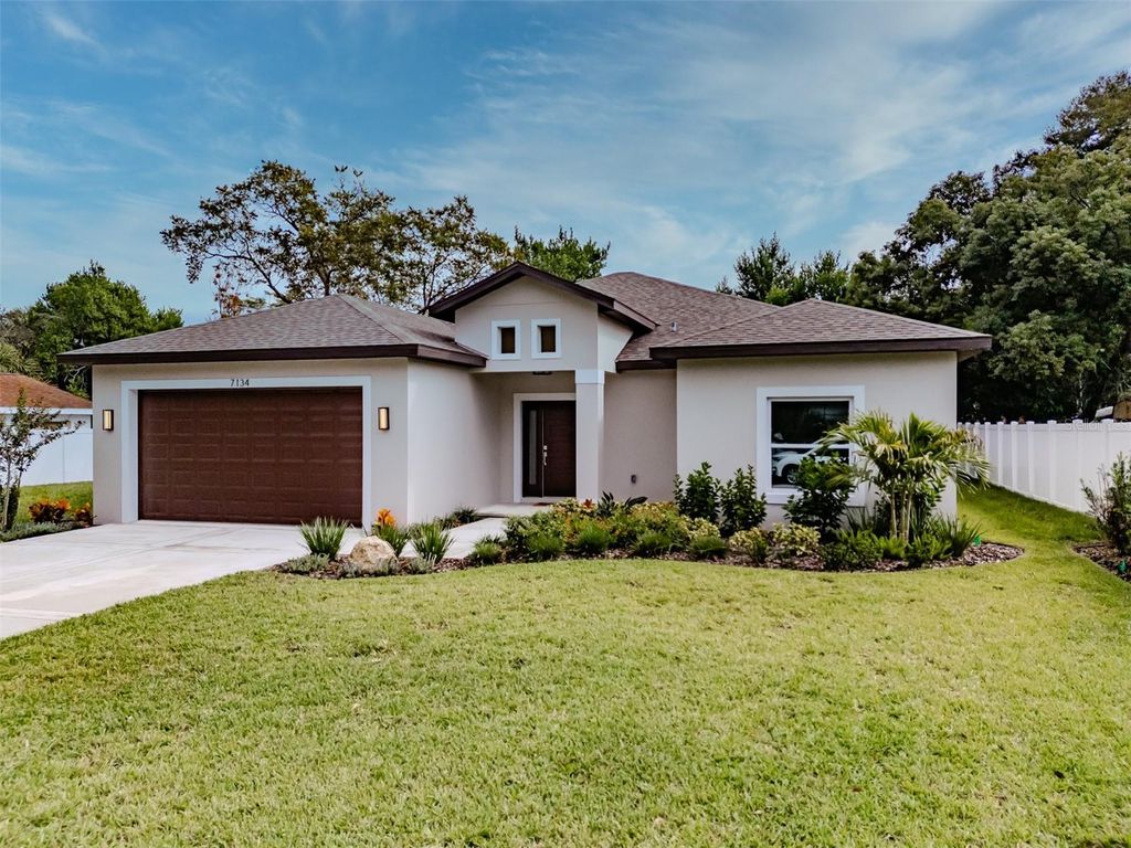 Photo of 7134 Maclura Drive, New Port Richey, FL 34653 (MLS # TB8443604)