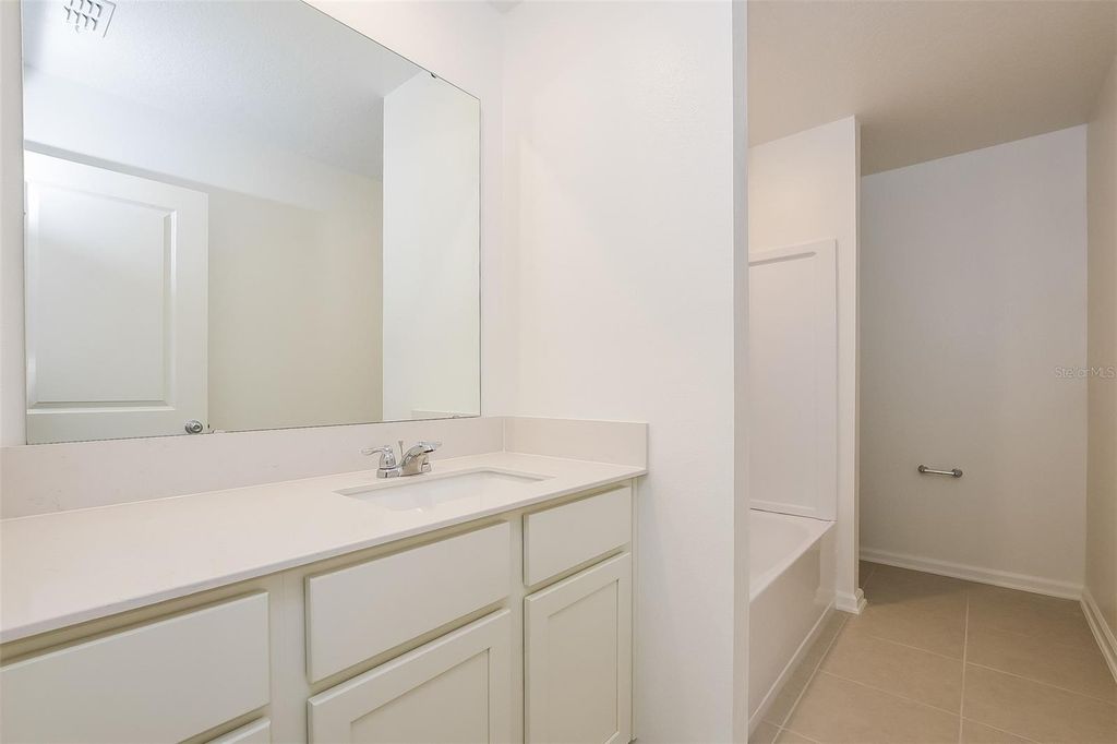 Photo of 3832 Amers Loop, Haines City, FL 33844 (MLS # O6368531)