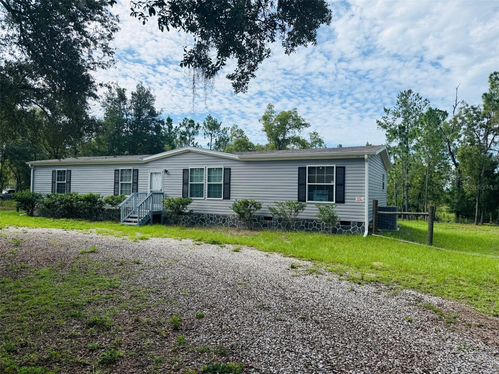 Nice 4Bed 2Bath HOME on paved 1.25 acres (MOL).