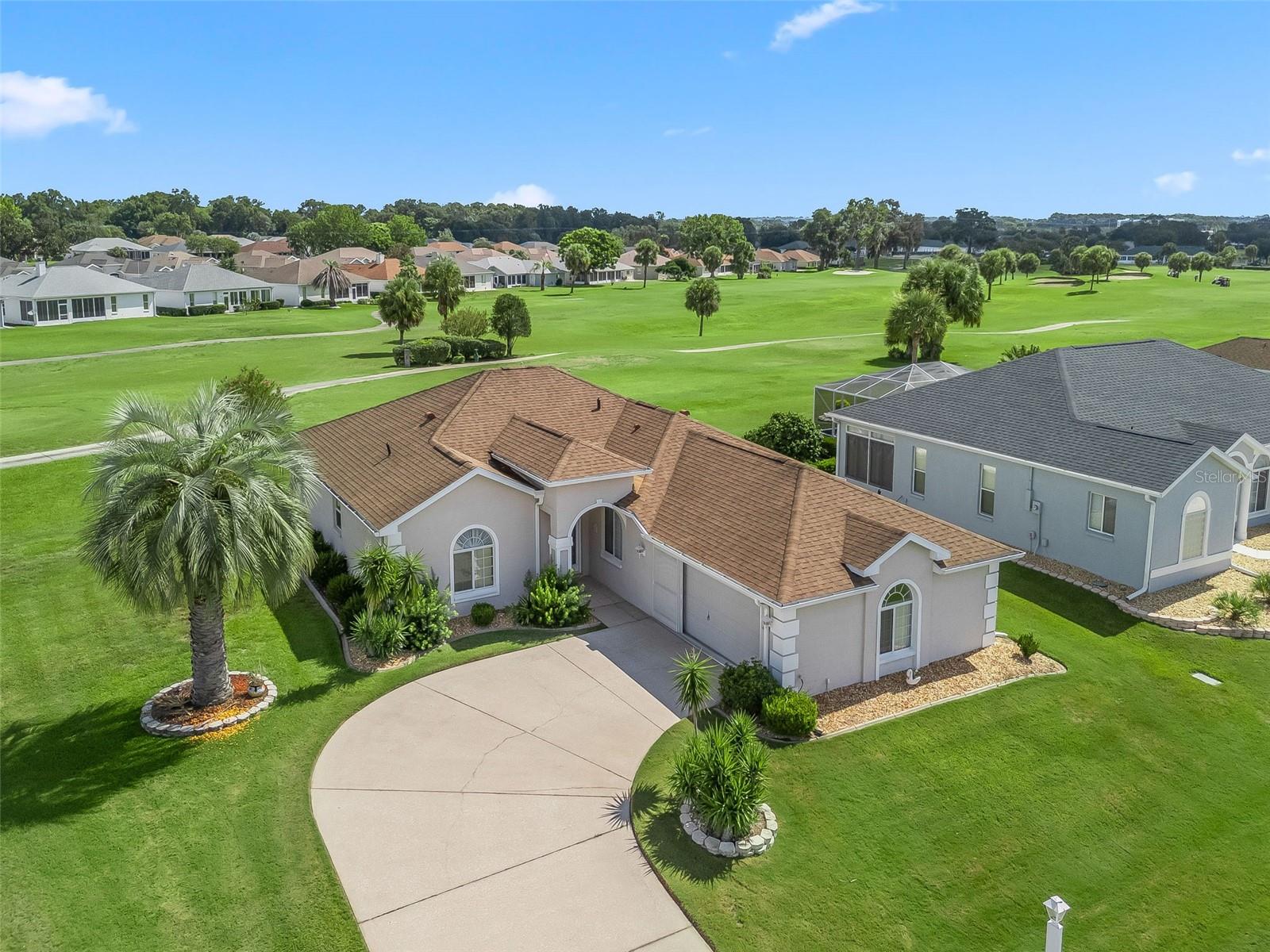 Welcome to this beautifully maintained home in the highly desirable Ocala Palms community, just minutes from the World Equestrian Center. Built in 2000, this spacious residence offers an open floor plan with soaring ceilings and abundant natural light. Featuring 2 bedrooms and 2 bathrooms with an office that also be a bedroom, this home is ideal for both relaxed living and entertaining. Enjoy scenic views of the golf course from your backyard, with a walking path providing additional open space and the feel of a larger yard. Inside, the home has been freshly painted and includes appliances that are just 3 years old. Major updates include a roof replacement in 2016, new HVAC in 2018, and a water heater installed 4 years ago. Don’t miss the opportunity to own a move-in ready home in one of Ocala’s most sought-after 55+ communities!