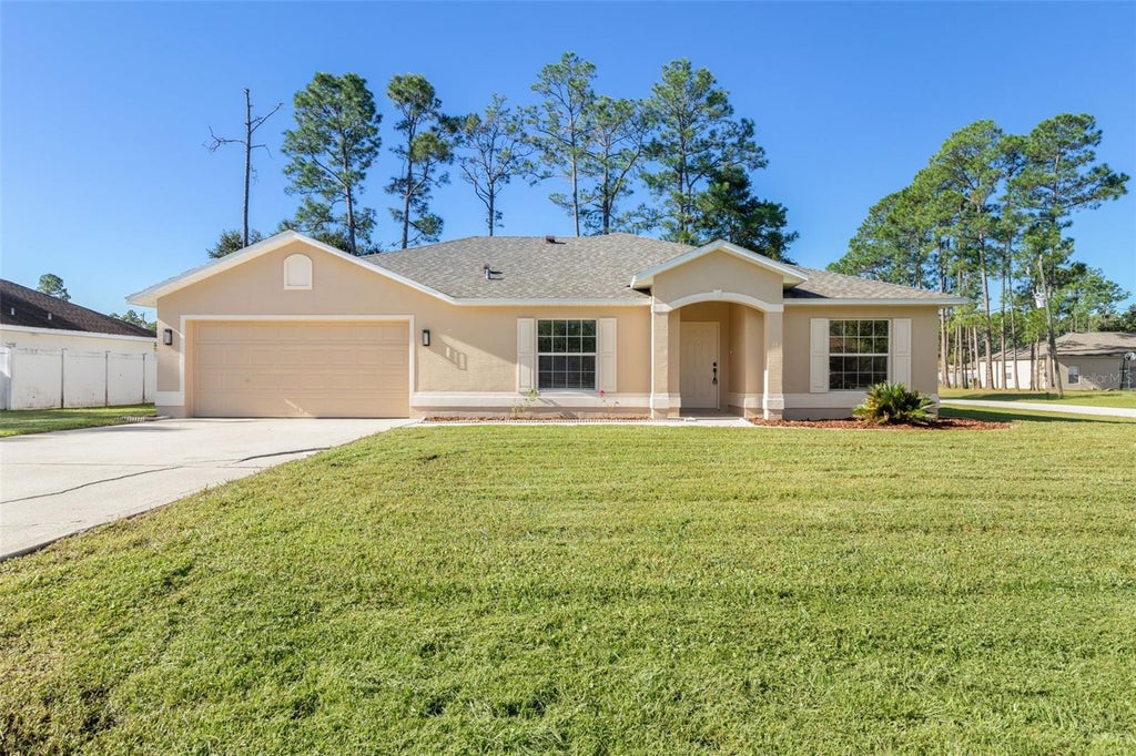 Photo of 46 Rickenbacker Drive, Palm Coast, FL 32164 (MLS # FC322001)