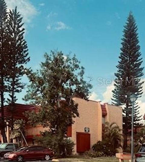 Photo of 2854 N Powers Drive #11, Orlando, FL 32818 (MLS # O6358997)