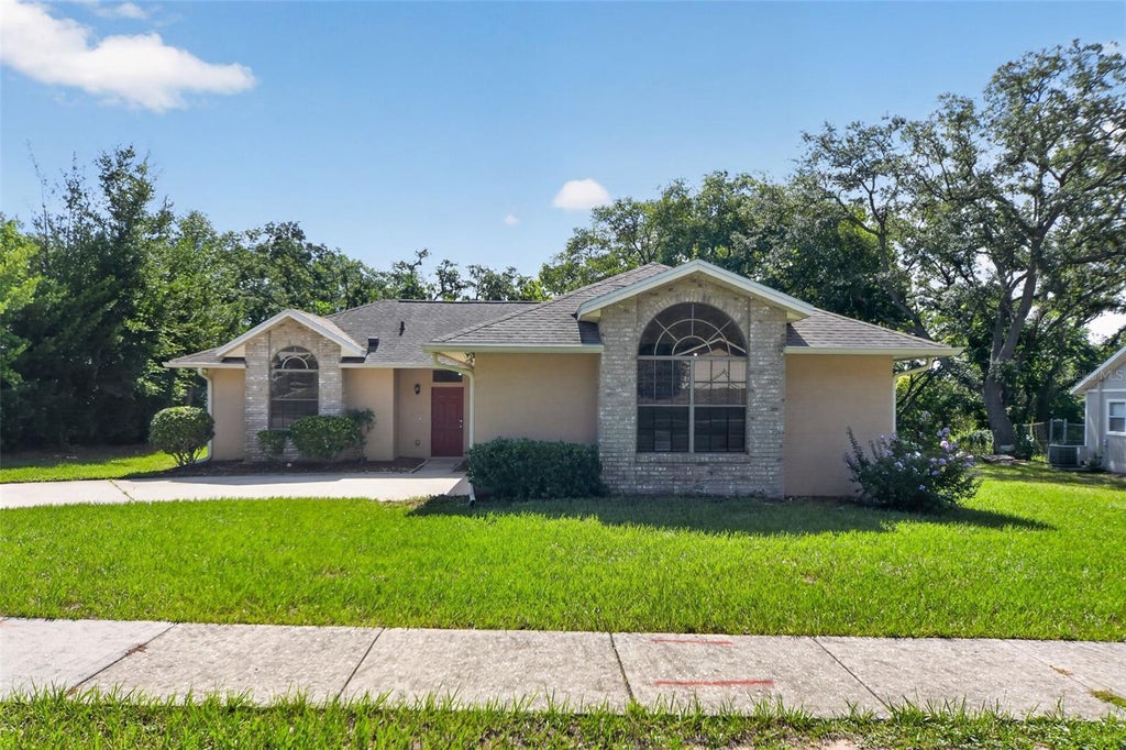 Photo of 6348 Sleepy Hollow Drive, Orlando, FL 32810 (MLS # O6425570)