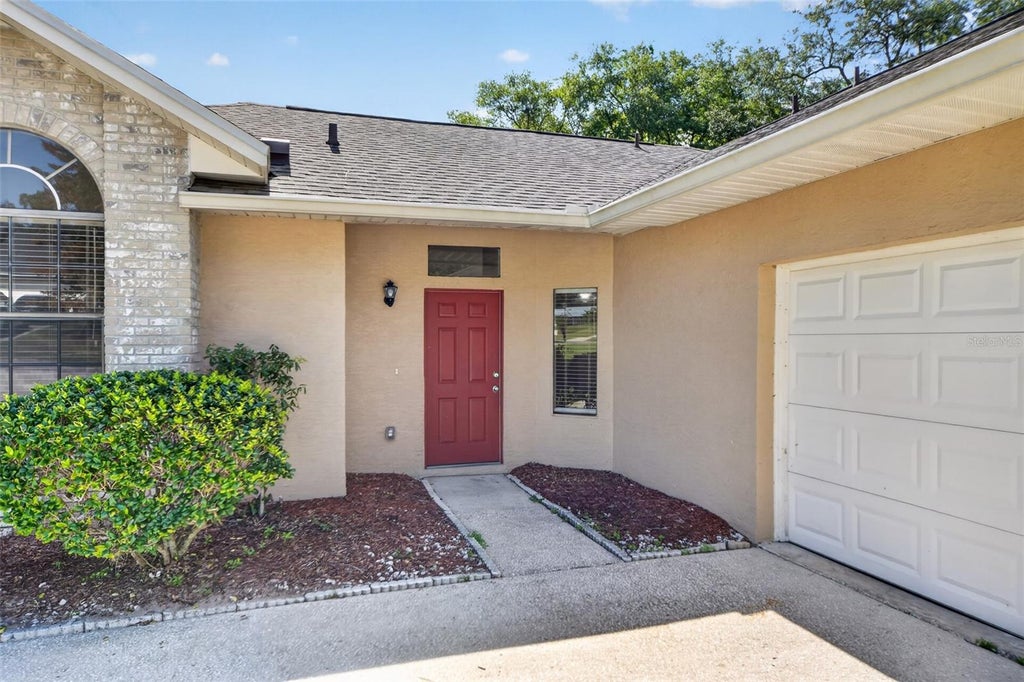 Photo of 6348 Sleepy Hollow Drive, Orlando, FL 32810 (MLS # O6425570)