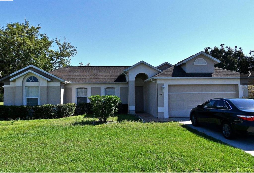 Photo of 3230 Windmill Point Boulevard, Kissimmee, FL 34746 (MLS # O6372398)