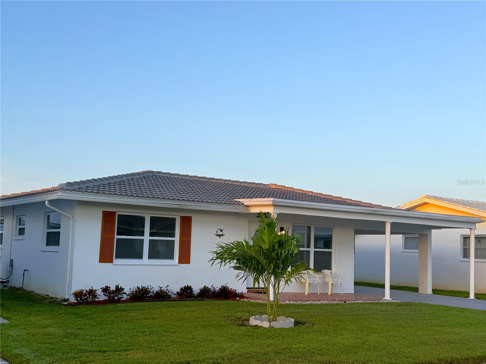 Location, Location, Location! Discover The Mainlands of Tamarac! You will love this Completely updated turn-key easy to maintain home featuring: All New High Impact Hurricane Windows, Gorgeous New front entry door with glass oval inlay, New Roof, New HVAC, and New Water heater. The Kitchen is a real showstopper with all new modern shaker cabinetry, Quartz Counter tops and backsplash, sleek Whirlpool Stainless Steel appliances, low profile microwave and deep sink, complete with a large breakfast bar open to the Family room. This open floor plan has so much to offer with all new Luxury Vinyl Flooring, baseboards, Interior paint, outlets and light switches. All new ceiling fans, light fixtures and recessed Led lighting. The bonus room with French doors would be perfect for a craft room, home office or gym. Large indoor laundry room featuring washer and dryer. Master bedroom features a large wall to wall closet. The guest suite also has a large closet with recessed lighting. Updated bathroom hosts a new vanity, updated hardware, oval mirror, stylish new lighting, additional mounted cabinet and updated toilet. Large carport hosts floor to ceiling storage cabinets for all your storage needs. Nestled in a vibrant, amenity-rich community, you'll enjoy easy access to Mainlands Sparkling Community Heated Pool and Clubhouse, Mainlands Golf Course, Freedom Lake Park that offers: Dog Park with large, fenced exercise space separated for large and small dogs, hydrants, watering holes, and plenty of shade for your pets, covered outside fitness stations, fishing, grilling, picnic tables, pavilions, new playground, walking track and the Korean War Memorial. This home's ideal location puts you close to all the best that the area has to offer - from world-class Gulf Beaches, Sam’s Club, Coffee Shops, Fitness Centers, shopping, dining, Helen Howarth Park, Equestrian Trail, Dog Park, and Forbes recreation area, I-275, St. Pete/Clearwater and Tampa International Airports. Whether you're an adventure-seeker or simply seeking a peaceful oasis, this home offers the perfect setting to elevate your Florida lifestyle.