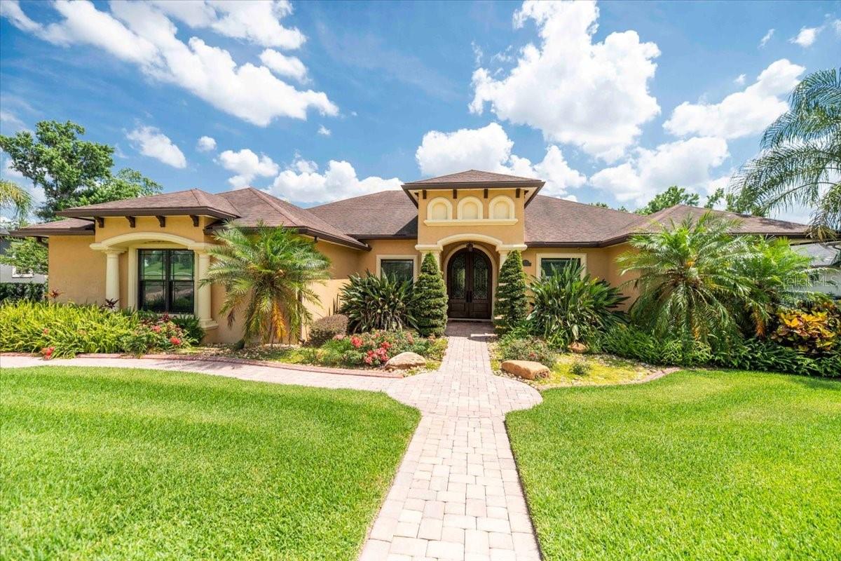 Live Lavishly in the Heart of South Lakeland’s Most Coveted Community – Welcome to The Ashley!
Tucked behind the elegant gates of the Ashley community in 33813, this Mediterranean Revival masterpiece blends timeless charm with modern luxury. With 4 spacious bedrooms, 4 full baths, and a dedicated office with its own closet, this split floor plan offers the perfect combination of comfort, functionality, and style.
Movie nights just got an upgrade in your private screening room—complete with projector, screen, and whole-house AV system that all convey. Entertain effortlessly in a chef’s dream kitchen featuring a gas cooktop with exterior propane tank, while guests mingle on the screened patio (new in 2019) or lounge by the heated saltwater pool and spa, complete with a 2024 salt generator and beach-style sun shelf.
Peace of mind comes standard with a Generac generator system, updated ADT security, closed-circuit cameras, and newer hurricane-rated windows and sliders (all except the front elevation). The tankless water heater, new garage door motor (2024), and epoxy garage floors add extra polish to this well-maintained gem. Plus, enjoy year-round comfort with a new A/C installed in 2025.
Whether you’re working from home, hosting unforgettable gatherings, or simply soaking up the Florida sunshine, this home is ready to impress.
Don't miss your chance to experience elevated living in one of 33813’s finest neighborhoods. Schedule your private tour today—luxury, comfort, and security await!
