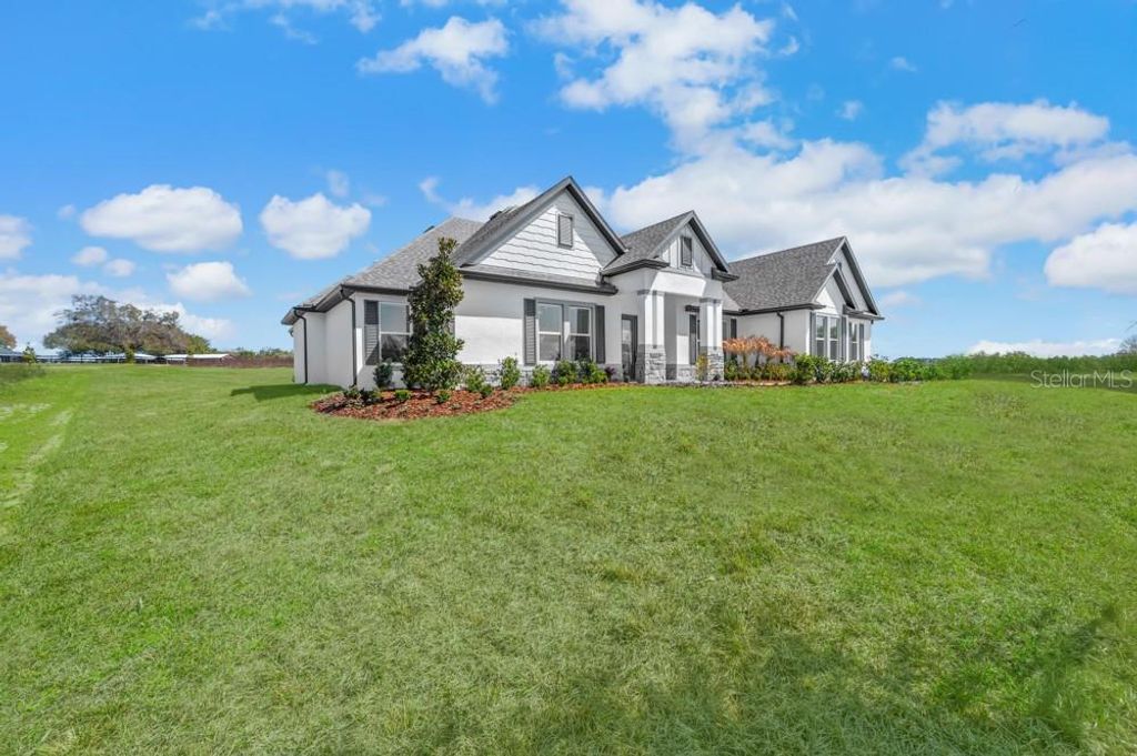 Photo of 3832 Saddle Hill Trail, Fruitland Park, FL 34731 (MLS # TB8488341)