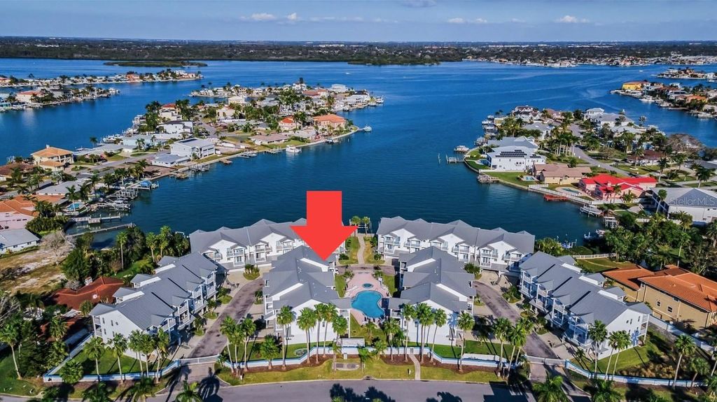 Photo of 106 Yacht Club Circle, North Redington Beach, FL 33708 (MLS # TB8469469)