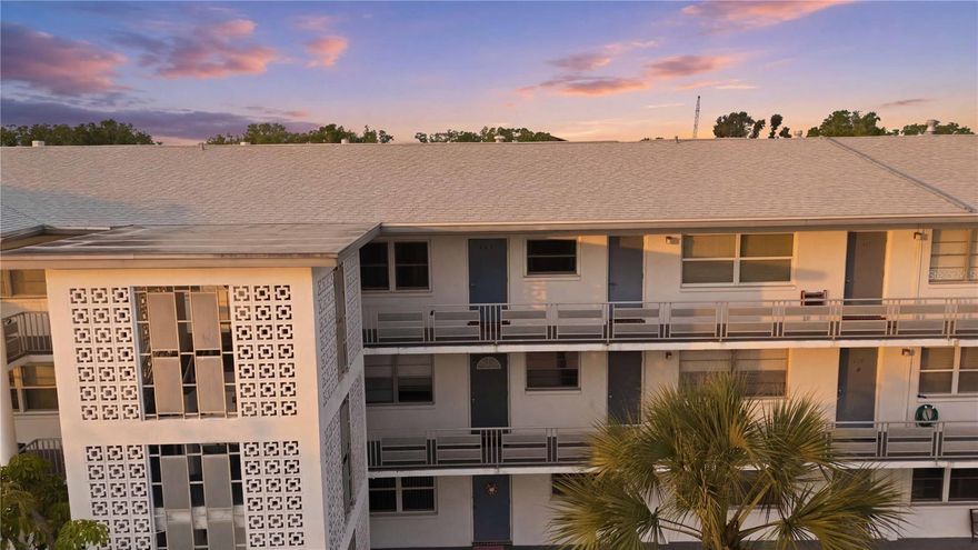 One or more photo(s) has been virtually staged. Enjoy your own piece of sunshine in the Sunshine State! This 2-bedroom, 3rd-floor condo in St. Petersburg offers easy, low-maintenance living in an active and welcoming 55+ community with a full calendar of events and activities to keep you as busy (or relaxed) as you’d like.

Take the elevator up and step inside to a bright and inviting space featuring an open living and dining room combination, perfect for everyday living or entertaining. You’ll love the no carpet here—with laminate flooring throughout for easy care and a clean, modern feel. The kitchen is ready for the home chef with a gas cooktop.

One of the standout features of this home is the sunny bonus room—a beautiful space lined with windows that fill the room with natural light. Whether you’re looking for a cozy reading nook, hobby room, home office, or additional living space, this sunroom gives you the flexibility to make it your own.

The spacious bedrooms offer comfort and functionality, and with the elevator conveniently located nearby along with the laundry facility, everyday living is simple and accessible. Assigned covered parking adds even more convenience.

This well-maintained community truly shines with amenities and a vibrant social atmosphere. Enjoy the heated pool, recreation center, shuffleboard, and a full lineup of activities including bingo, card games, clubs, dancing, yoga, and more—there’s always something happening and new friends to meet!

And then there’s the location… 
Living in St. Petersburg means you’re just minutes from everything that makes this area so special. Spend your days exploring downtown St. Pete, known for its waterfront parks, art scene, local events, and incredible dining and shopping options. From weekend markets to festivals and live music, there is always something to experience. And of course, you’re just a short drive to the world-famous Gulf beaches, where soft white sand and stunning sunsets become part of your everyday life.

With monthly maintenance covering gas, water, sewer, cable, trash, exterior maintenance, and more, this is truly easy, Florida living at its best.

Come see it for yourself and start enjoying the lifestyle you’ve been waiting for!