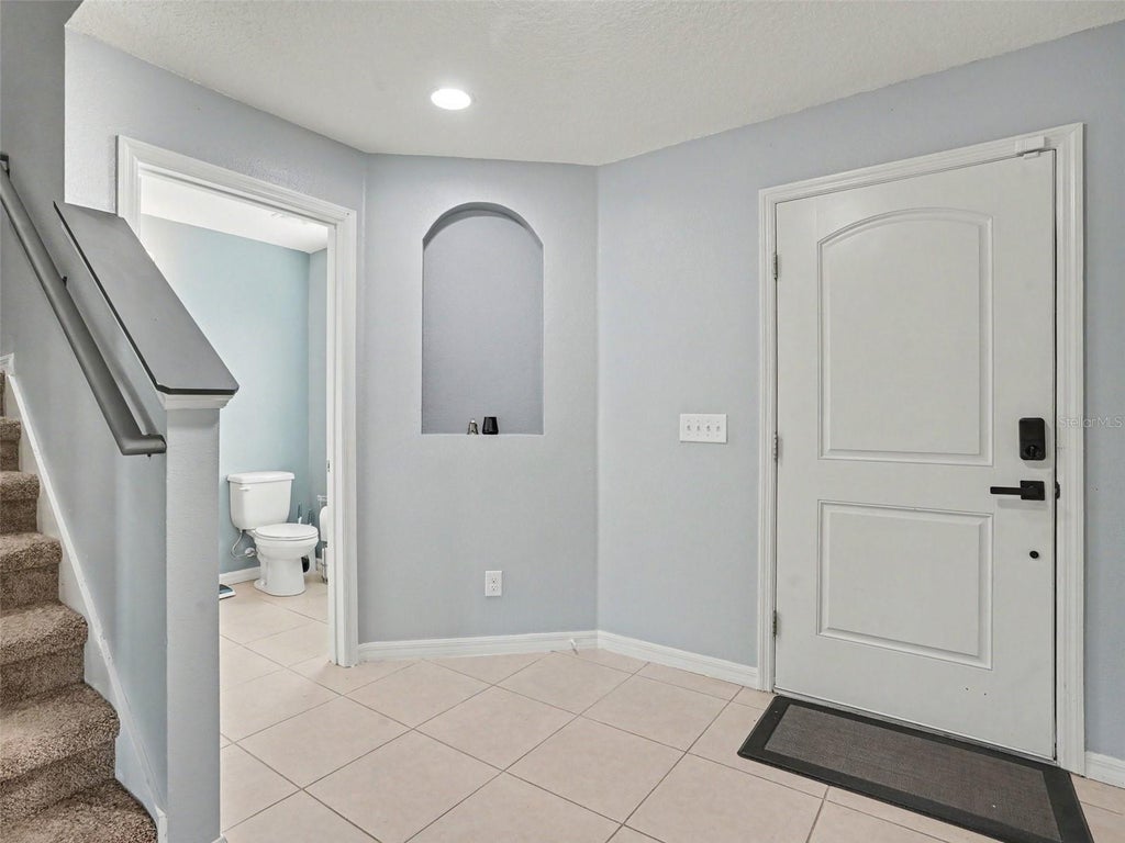 Photo of 5660 Elsinore Way, Lakeland, FL 33805 (MLS # TB8552127)