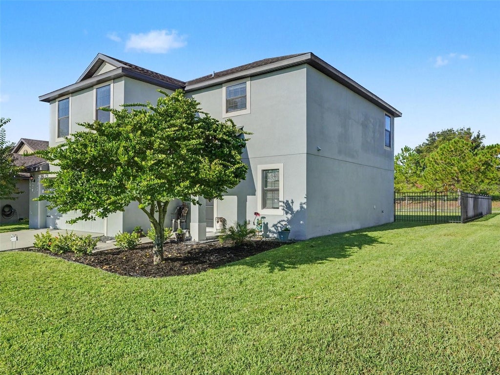 Photo of 5660 Elsinore Way, Lakeland, FL 33805 (MLS # TB8552127)