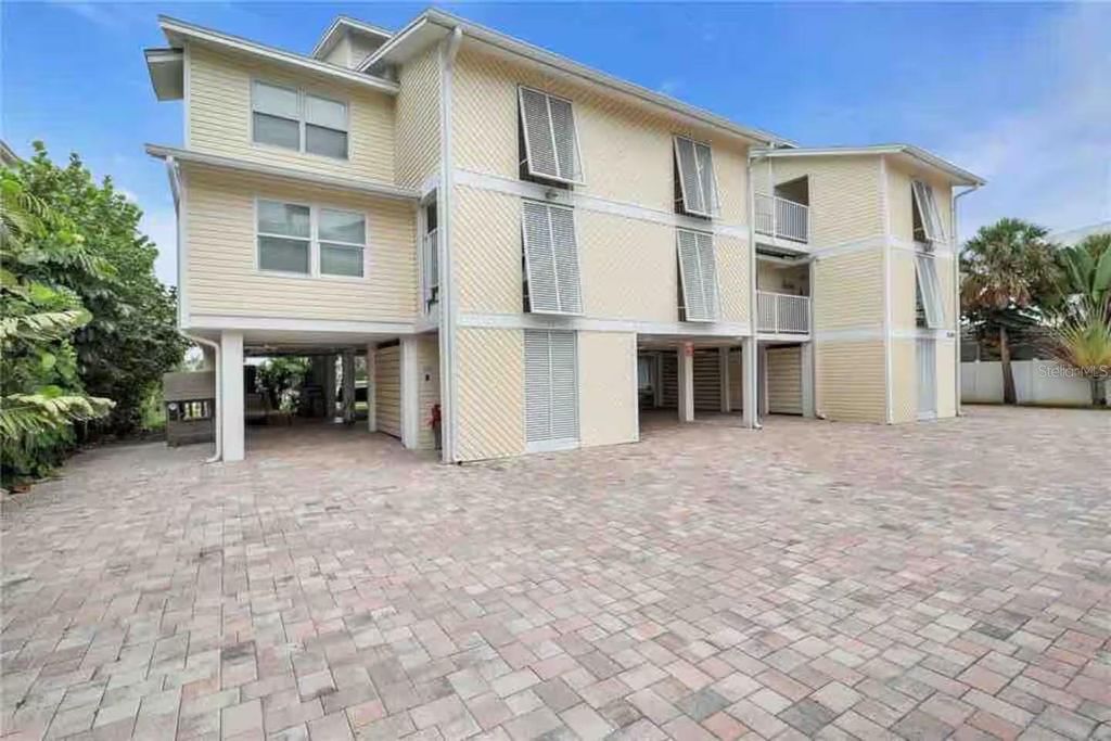 Photo of 10109 Gulf Boulevard #202, Treasure Island, FL 33706 (MLS # TB8410827)