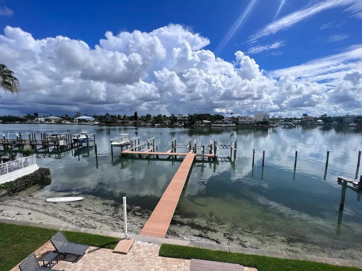 NO HURRICANE DAMAGE! Welcome to your Waterfront Treasure in the Heart of Treasure Island!
Serendipity on Treasure Island — a charming 3-bedroom, 2-bath condominium offering stunning water views from every room and an unbeatable location just steps from the beach.
This bright, inviting unit features an open-concept living and dining area, a fully equipped kitchen, and an in-unit washer and dryer for added convenience. High-speed internet and smart TV access are included, making it ideal for full-time living, vacation stays, or investment opportunities.
Enjoy the best of both worlds: kayak or paddleboard from the community dock, watch dolphins play along the Intracoastal Waterway, or walk 100 feet across the street to one of Florida’s most beautiful white-sand beaches.
Community amenities include:
• Waterfront common area with flat-screen TV, picnic tables, swings, ping pong, darts, and more
• Easy access to kayak, fishing gear, and boat rentals
Private boaters will appreciate:
• A private deep-water boat slip with a lift, available to guests
• Public boat ramps conveniently located within 1.5 miles
Whether you're seeking a serene getaway or the perfect waterfront lifestyle, Serendipity on Treasure Island delivers an exceptional opportunity in one of the Gulf Coast’s most sought-after locations.