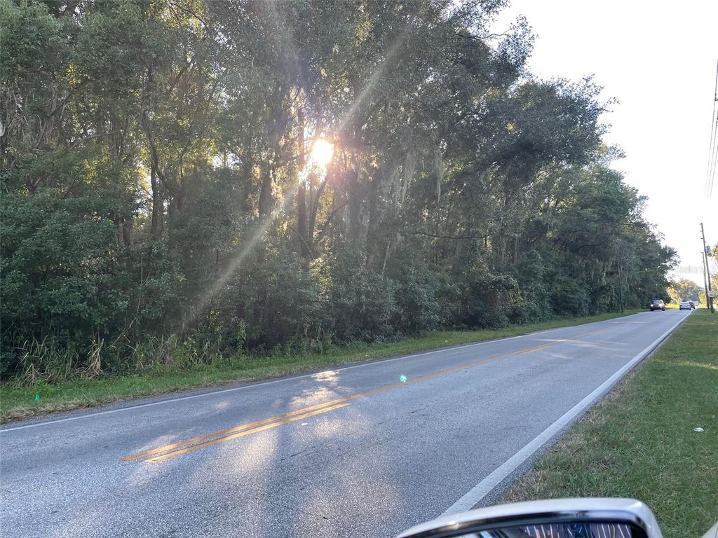 Photo of 1290 W Plymouth Avenue, Deland, FL 32720 (MLS # V4933446)