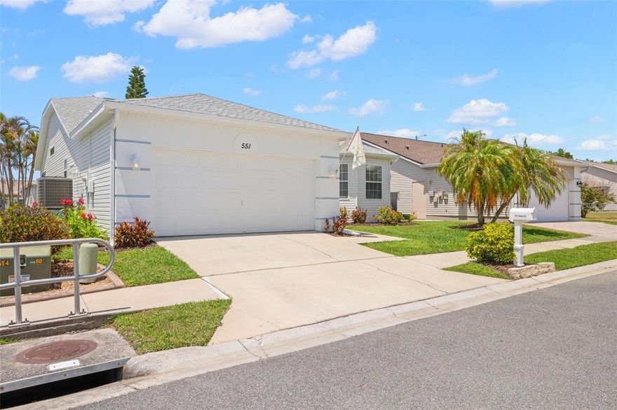 One or more photo(s) has been virtually staged. Welcome to this well maintained single-family block home in Gull Aire Village, a friendly 55+ community known for low fees & great amenities. (not a manufactured home)  With 2 bedrooms, 2 baths PLUS a 2 car garage, this home has been lovingly cared for & is truly move-in ready.  Here are some of the fresh updates that will give you a great first impression:  fresh exterior paint & mulch for curb appeal, fresh interior paint in Sherwin-Williams "Reflection" (a soft gray).  There is a welcoming entry foyer with easy access to the great room & dining room.  You will love the spacious, open layout of this interior with vaulted ceilings & a split-bedroom design that makes hosting guests extra comfortable.  The kitchen is very neutral with gray Formica countertops & crisp white cabinetry.  There are newer stainless-steel appliances, bright, neutral ceramic tile that matches the entry foyer and both baths.  The sunny breakfast area with lots of natural light & a bay window with seating is a joy.  The guest bedroom is at the front of the house with a bay window & plenty of room for your furnishing.  The primary bedroom is a comfortable, generously sized retreat with space for a wide range of furniture, & the primary bath has double sinks, a large shower area & a huge walk-in closet.  Step out back & relax in the enclosed rear lanai with windows for all year use, ceiling fans for a nice breezy space & a window A/C to keep things comfortable in the warmer months.  The sliding doors from either the master bedroom or the great room lead right out to the lanai.  From there, you can head out to the large paver patio that spans the width of the home - complete with retractable awnings for shade.  For extra peace of mind, many of the big-ticket items have already been taken care of:  Roof (2021), HVAC (2018), Water heater (2018), a Square D electrical panel, & a new service door on the side of the garage.  Gull Aire Village is a very affordable retirement choice;  monthly HOA fees only $70 per month & that gets you some great amenities!  You have all these things to enjoy: a heated pool, hot tub/spa, shuffleboard courts, bocce ball, clubhouse for gatherings or playing pool, or cards, or a little work out, or read a book in the library.  Golf carts are street legal within Gull Aire, so take a ride over to your friends house, join the Christmas parade or just tour the neighborhood when you feel like it.  You can also walk along the paved path along the Tarpon outflow canal & hit the Oldsmar trail for an extended walk.  Great location near (and walkable!) shopping & restaurants, movie theatre.  Medical facilities & airports are nearby & the beautiful Gulf beaches are not far!!  This is a great opportunity for someone looking to retire and live the easy life.  Realtor is owner (this was my mothers home)