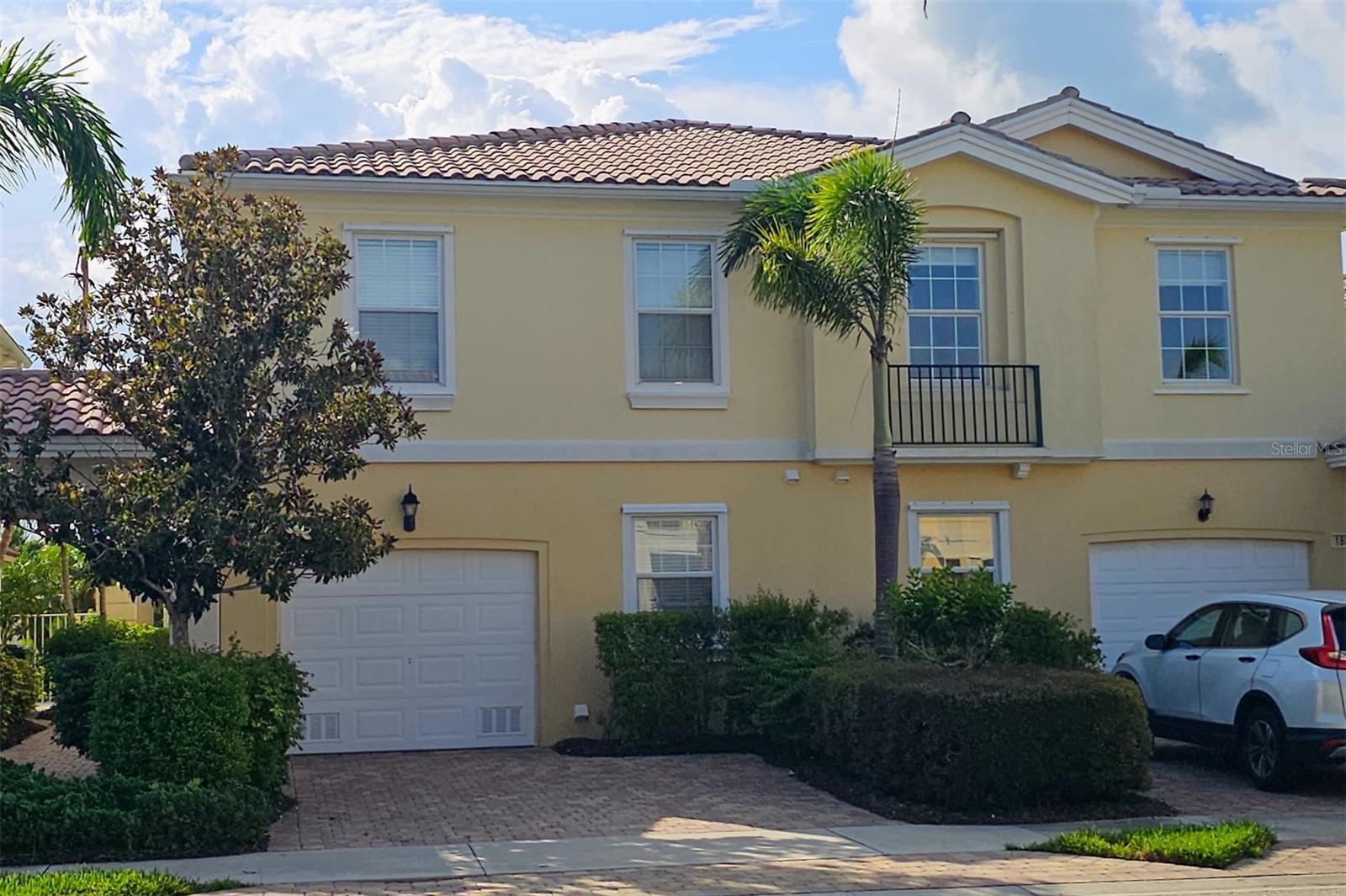 Elegant Updated Townhome with Pond View and Exceptional Amenities!
Welcome to this beautifully updated and move-in ready townhome that combines timeless elegance with modern convenience. Nestled in the desirable, amenity-rich Isles of Sarasota community, this home features tasteful upgrades throughout and offers both comfort and functionality for everyday living.
Upon entering, you're greeted by fresh, neutral-toned paint that sets a warm, inviting atmosphere and highlights the home’s clean, modern lines. The open floor plan showcases updated stone-like ceramic tile flooring in the main living areas and luxurious vinyl plank flooring upstairs—blending style with durability.
The updated kitchen is a focal point of the home, boasting newer stainless-steel appliances, ample cabinetry, and generous solid surface counter space perfect for everyday use or entertaining. Adjacent to the kitchen is a dedicated laundry room complete with additional countertop space, making chores convenient and efficient.
Downstairs, a well-placed half bath adds practicality for guests, while upstairs you’ll find two full baths, both thoughtfully renovated with upgraded showers and contemporary fixtures. The primary suite offers a peaceful retreat with an en-suite bath and a spacious walk-in closet. A second walk-in closet and a large hallway closet upstairs, plus cleverly designed under-stair storage, housing the central vacuum system, ensure there’s plenty of space for all your belongings.
Enjoy added peace of mind with a built-in alarm system and keyless entry included. Basic cable and internet are also included, offering exceptional value and convenience.
Step outside to your private, oversized screened patio—an ideal place to relax with a morning coffee or unwind after a long day. This generously sized outdoor space overlooks a serene pond, creating the perfect backdrop for outdoor dining or simply soaking in the beauty of nature.
This townhome is part of a vibrant community featuring a resort-style pool and spa, tennis courts, pickleball, a playground, and well-maintained green spaces. Whether you’re looking to stay active or simply enjoy the Florida sunshine, this community offers amenities for every lifestyle.
With its elegant updates, thoughtful layout, abundant storage, and tranquil water view, this townhome is a rare find. Don’t miss your opportunity to make it yours.