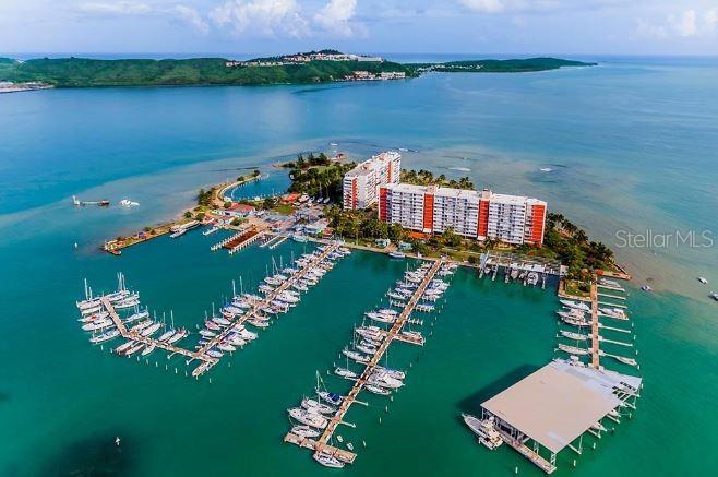 This property, Isleta Marina Unit 10E, is a one bedroom one bathroom apartment in the Isleta Marina complex in Fajardo, Puerto Rico.
Isleta Marina is a 7 acre island a little under a mile off the coast of Fajardo. The complex consists of two condominium buildings, pools, basketball courts, tennis courts, playgrounds, a restaurant/store/bar, extensive boat slips, boat storage, a full service marine shop, and more.
The Isleta Marina Island is right next to the Cayos de la Cordillera Natural Preserve, is surrounded by coral reefs, and has spectacular 360 degree views all around the Island. Views range from the main island of Puerto Rico, to close off Islands such as Iacos and Palomino, to more distant Islands such as Culebra and Vieques, to the distant Islands of the United States Virgin Islands, to the vast expanses of the Atlantic Ocean and Caribbean Sea.
Access to the Island is supplied by a small passenger ferry that runs every 15 minutes 6:30am to 11:30pm 365 days a year. For cargo such as furniture, appliances, and other large items there is a small cargo ferry that runs on demand. Ferry travel time from the main island of Puerto Rico to Isleta Marina is less than 10 minutes.
The Unit itself is 1 bedrooms 1 bath with a Southern facing Balcony. The Unit has spectacular views of the complex marina, the main island of Puerto Rico, the Island of Vieques, the Bay of Fajardo, the Caribbean Sea and many smaller islands off the coast of Fajardo.
A wonderful apartment to live in full time, to utilize as an investment property, to live in part time and rent part time, or as a second home.