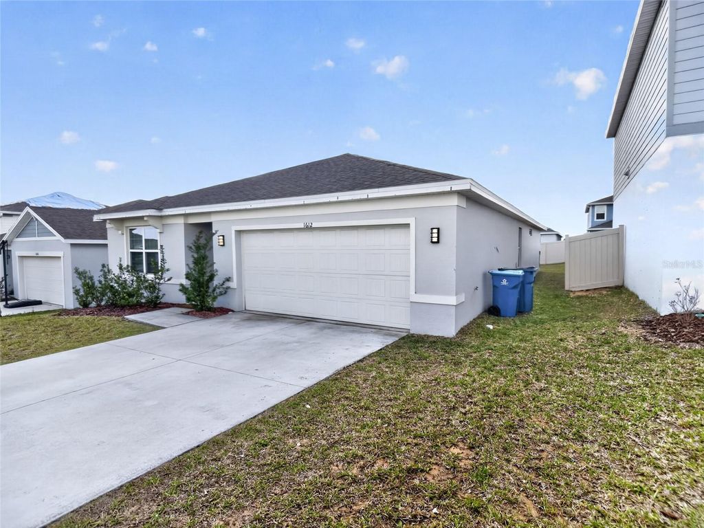 Photo of 1612 Aspen Avenue, Davenport, FL 33837 (MLS # O6396469)