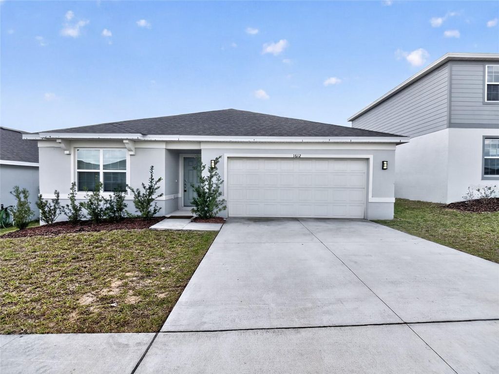 Photo of 1612 Aspen Avenue, Davenport, FL 33837 (MLS # O6396469)