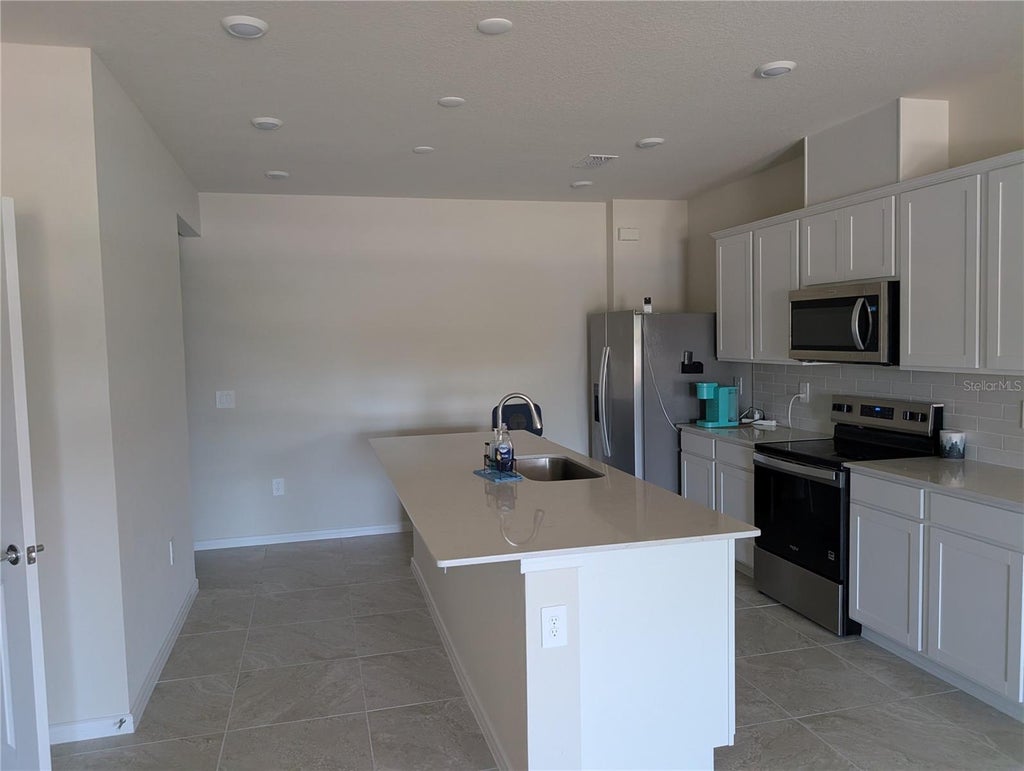 Photo of 2031 Tohoqua Boulevard, Kissimmee, FL 34744 (MLS # O6445128)
