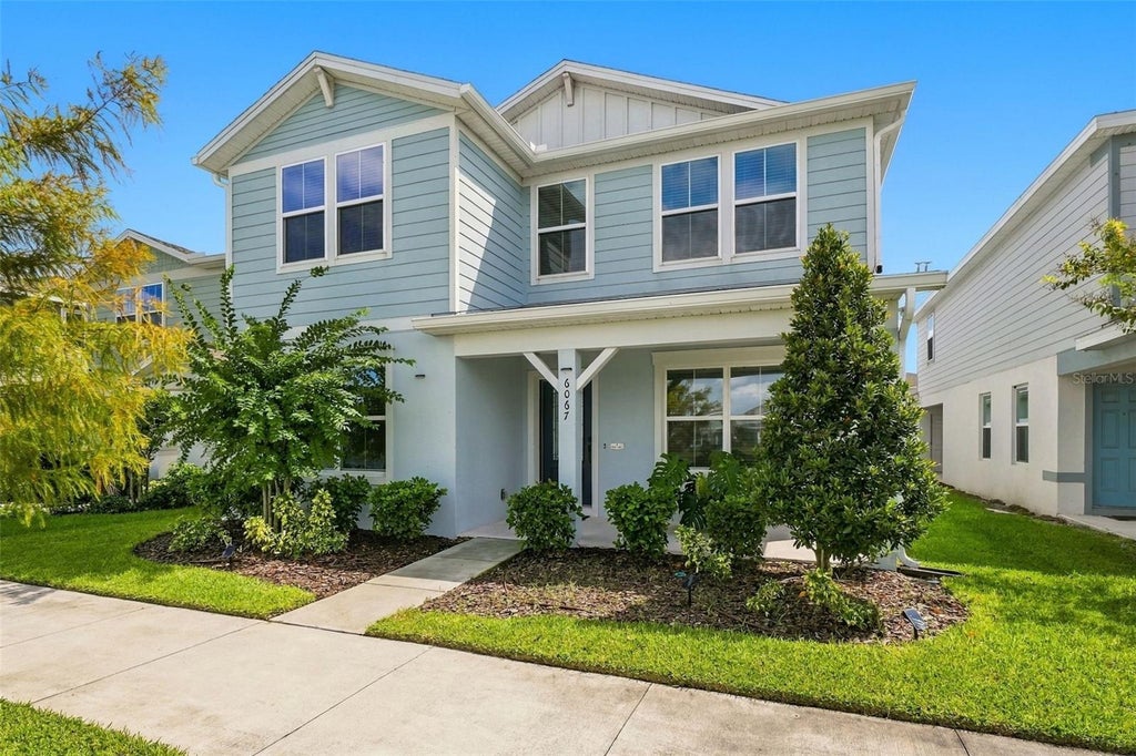Photo of 6067 Wooded Brush Alley, Saint Cloud, FL 34771 (MLS # O6441919)