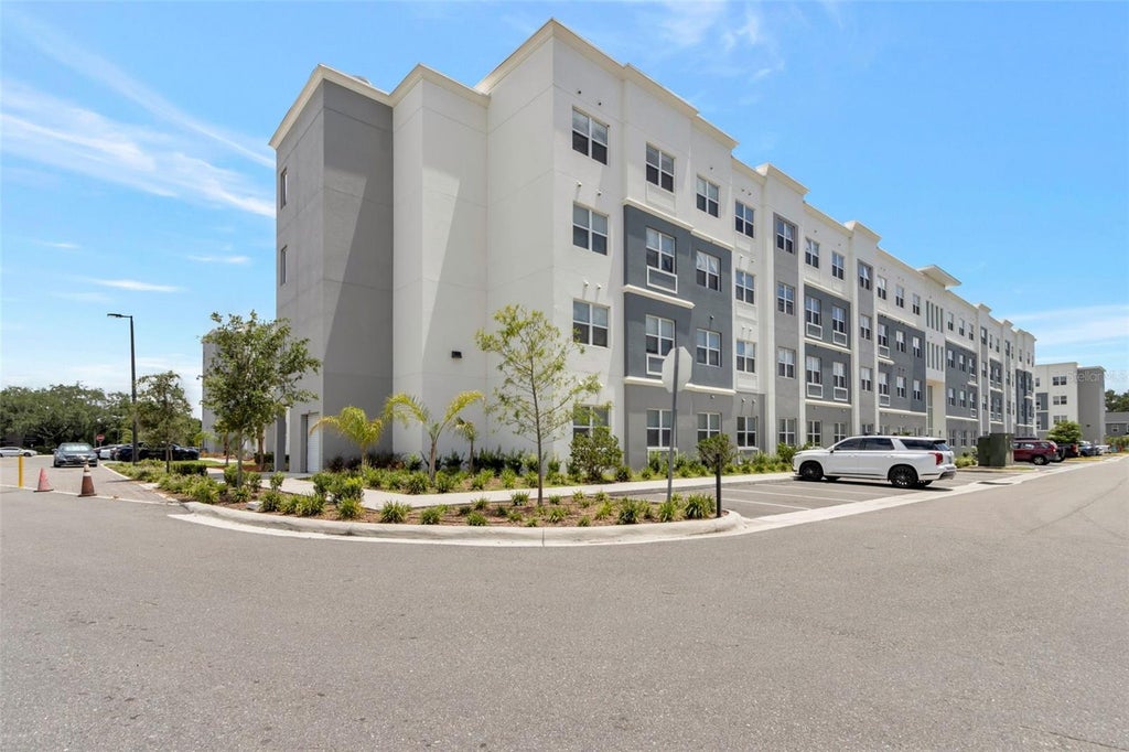 Photo of 1210 Southstation Place #207, Orlando, FL 32809 (MLS # O6422546)