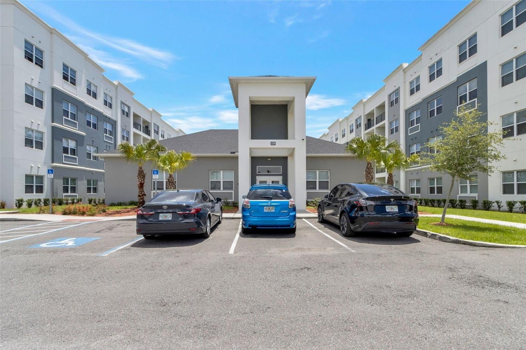 Photo of 1210 Southstation Place #207, Orlando, FL 32809 (MLS # O6422546)