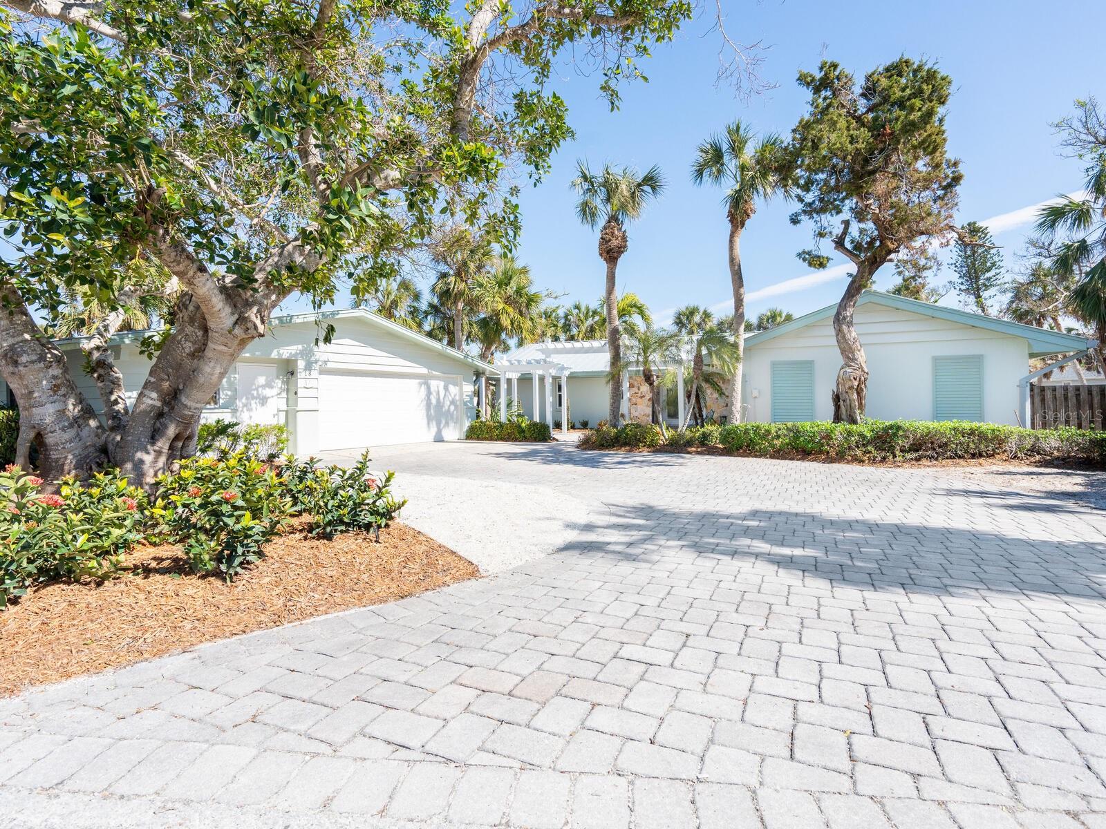 Beautifully remodeled in 2012, this bayfront residence combines elegance, functionality and an enviable location. The living room, kitchen and family room are great places to gather, and the split floor plan provides room for all, privacy to retreat with a good book or work from home options. The classic coastal style provides a view of the bay and intracoastal waterway from the primary bedroom. Set on more than half an acre, the expansive backyard and large screened pool provides a bayfront tropical paradise. The deeded easement directly across the street takes you to a private sandy beach where you’ll want to spend many a glorious sunny day on Casey Key. This residence was unaffected by recent storms, according to the owner, and shows resilience of a well-maintained home. New metal roof upgraded on the house and garage in 2020, HVAC replaced in 2020, new water heater in 2021, PGT impact windows and doors in 2012 and a new garage door in 2012. This location is ideal for ease getting on and off the key and positioned from the road. Close to shopping, restaurants, golf, tennis, recreational amenities, and just a short drive to vibrant cities of Sarasota and Venice.