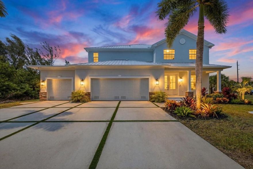 Welcome to 15408 Melport Circle — a striking fully renovated waterfront residence in the highly sought-after South Gulf Cove community, where modern design, scale, and Florida living come together.
From the moment you walk through the front doors, the home makes an unforgettable statement with soaring 20-foot ceilings, dramatic natural light, and a stunning modern glass staircase that immediately anchors the space with clean architectural elegance.
Recently transformed with high-end upgrades throughout, this residence features brand-new flooring, a completely redesigned chef’s kitchen, updated finishes, modern fixtures, and a refined contemporary aesthetic curated for both luxury living and entertaining.
The expansive layout offers oversized bedrooms and generous living spaces. The kitchen was designed to be the centerpiece of the home — combining sleek modern finishes with an oversized quartz island and an open-concept connection to the main living areas overlooking the water. With its rare scale, dramatic ceiling heights, designer renovation, waterfront setting, and iconic glass staircase focal point, this is far more than a typical South Gulf Cove home — it is a true statement property.