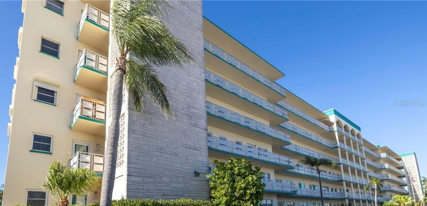 Sellers will pay the maintenance fee through the end of the year.  Owner financing available with 30% down . Come and see this beautifully updated and fully furnished unit that has a view of the harbor from your living center through the newer impact windows.  There are large porcelain tiles that shine like glass and has floors with the look of wood in the bedroom.  Keep your car free from the elements under your carport and meet new friends and neighbors at the community pool.  No pets.