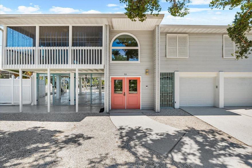 This elevated canalfront home on VERY rare 15,000 Sq. Ft. lot is not one to miss! In the heart of Holmes Beach, this LOCATION is everything. Perfectly positioned on an oversized lot of nearly 15,000 sq. ft., this property combines privacy, space, and stunning water views. The oversized lot provides rare breathing room and a sense of seclusion, while the property’s monthly rental zoning allows for flexible short-term rental opportunities without the heavy tourist traffic of nightly rentals. Step outside to your private pool and enjoy panoramic open-water vistas down the canal, or relax on the front porch where you can watch breathtaking sunsets every evening. Inside, the home has been thoughtfully renovated with a fresh, modern design and all new appliances--ready for you to move in and enjoy right away. Natural light in each room makes your island lifestyle come to life! Whether you’re looking for a serene island getaway or an investment opportunity, this Holmes Beach gem offers the best of both worlds--coastal charm, open water beauty, and everyday convenience