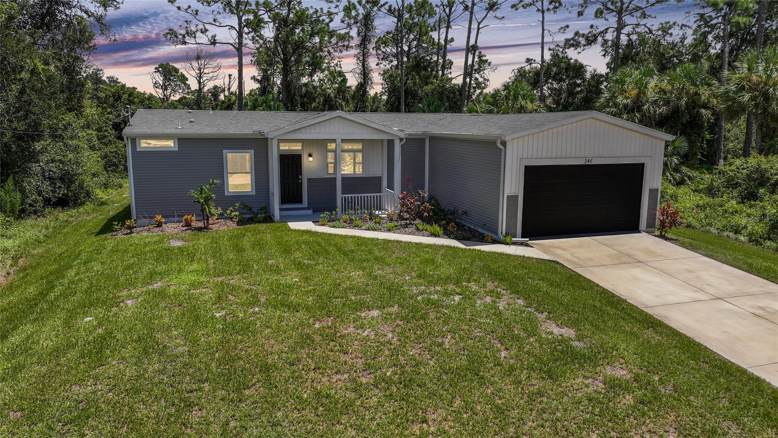 Limited time - 4.99% Interest Rate with the use of preferred lender. SURVIVED HURRICANE DEBBY, HELENE AND MILTON without barely a scratch. What an absolutely stunning Brand New home with warranty included and not in a Flood Zone. As you enter this home you will immediately notice the gorgeous kitchen overlooking a LARGE great room. The kitchen features a large center island , ALL high end stainless steel appliances, soft close wood cabinets, beautiful quartz countertops and stylish tile back splash. This home is perfect for entertaining guests as the kitchen overlooks the great room. The dining area is equipped with either a coffee bar or dry bar, the choice is yours. Enjoy peace and quiet in you lovely master suite with soft plush carpet and an en suite that features a large walk in closet, dual quartz sinks, large walk in shower and built in shelving for that extra storage. The master suite is also on the opposite side of the home for extra privacy. The 2 guest rooms also have soft plush carpet and ample space. For those that want a garage, this has enough room for 2 cars and has 8ft doors.There are also storm shutters that come with this home! The location of this home is also perfect as it is close to shopping, restaurants, golf courses and beautiful downtown punta gorda. The island of Boca Grande is about 25 miles from property as well as some beautiful beaches. Be sure to look at this home first as you will NOT be disappointed! Please see 3D tour attached to this listing
