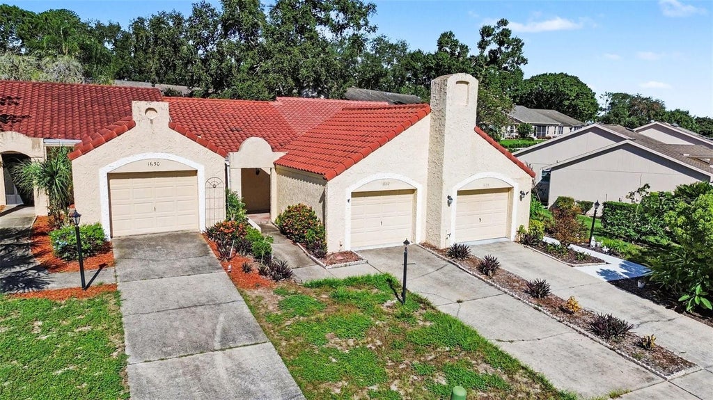 Photo of 1652 Highland Club Lane, Palm Harbor, FL 34684 (MLS # TB8545125)